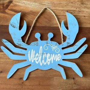 Hanging crab welcome sign